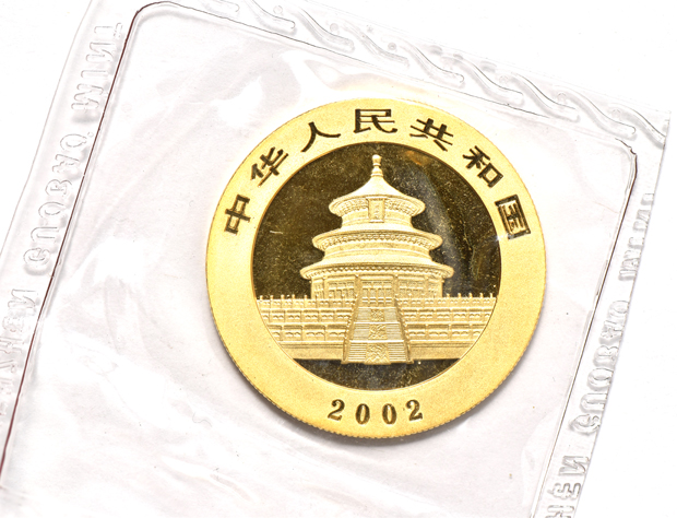 China - 2002 1oz gold Panda 500 yuan sealed, 2003 frosted 1oz gold Panda 500 yuan double sealed, and a 2004 1oz gold Panda 500 yuan sealed