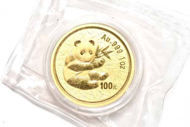 China - 2000 frosted 1oz gold Panda 100 yuan double sealed, and a 2001 1oz gold Panda 500 yuan sealed with ribbon