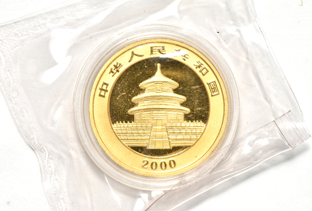 China - 2000 frosted 1oz gold Panda 100 yuan double sealed, and a 2001 1oz gold Panda 500 yuan sealed with ribbon