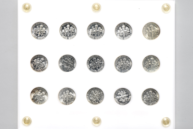 Collections of silver Proof Roosevelt dimes, Washington quarters, and Franklin half-dollars in three Capital Plastics holders