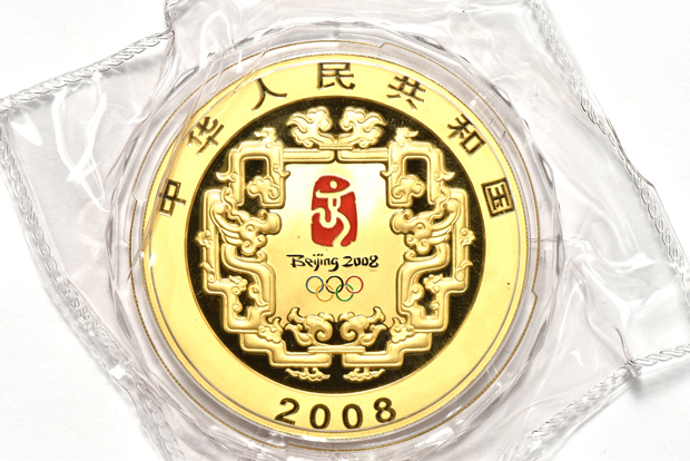 China - 2008 5oz gold Olympics Modern Sports 2000 yuan with wooden pedestals, certificate, dragon statuette, and outer case
