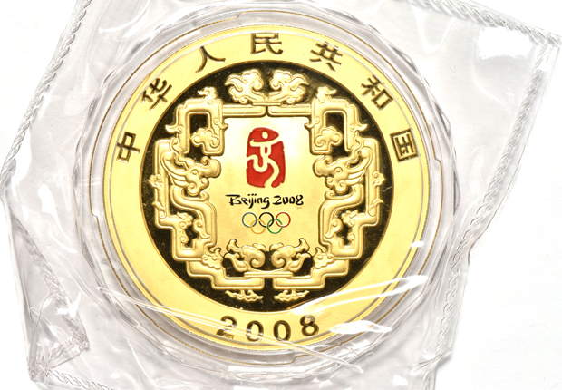 China - 2008 5oz gold Olympics Modern Sports 2000 yuan with wooden pedestals, certificate, dragon statuette, and outer case