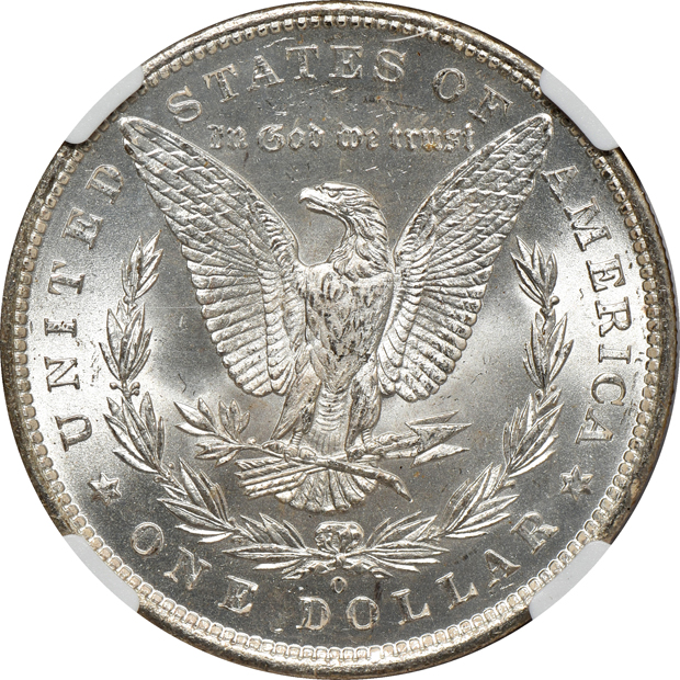 Four toned silver dollars certified MS-65 by NGC