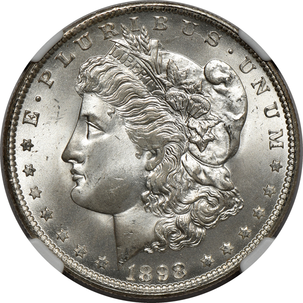 Four Morgan silver dollars certified by NGC