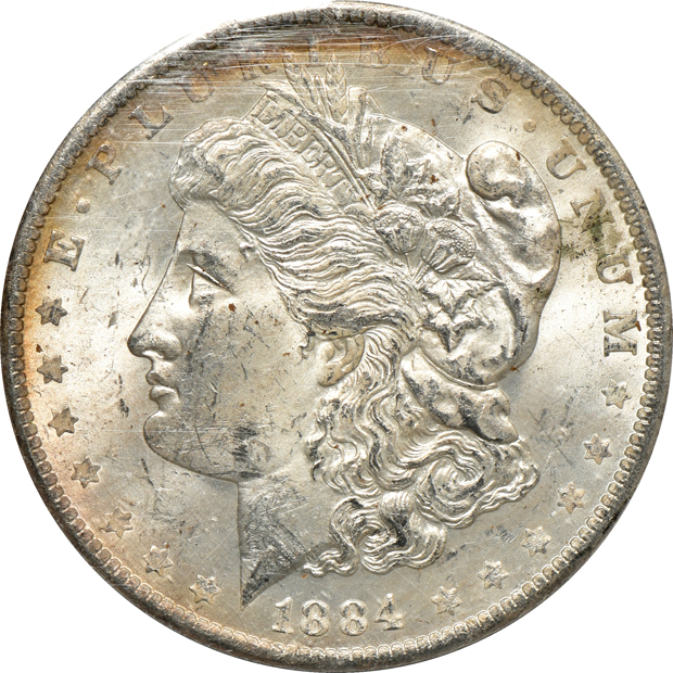 1882-O GSA softpack XF, 1882-O GSA softpack NGC AU-53, and an 1884-O GSA softpack NGC MS-63