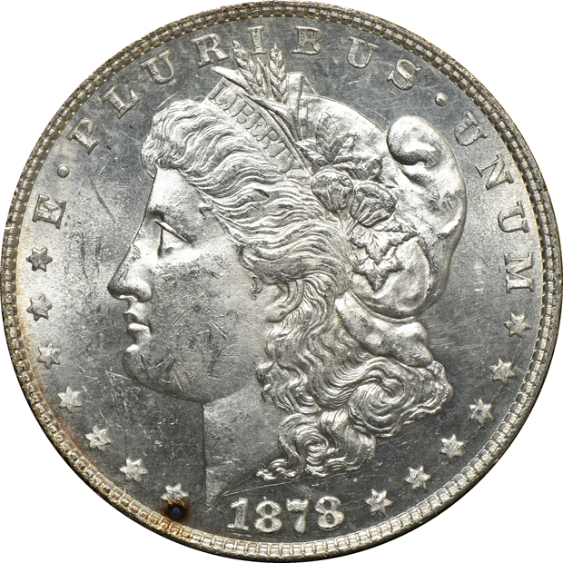 1878 Morgan silver dollar set in a Capital Plastics holder