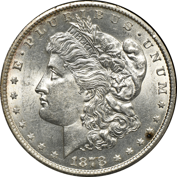 1878 Morgan silver dollar set in a Capital Plastics holder