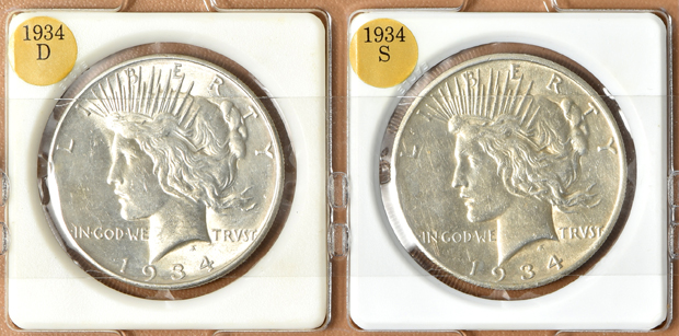 Twenty-two Peace silver dollars