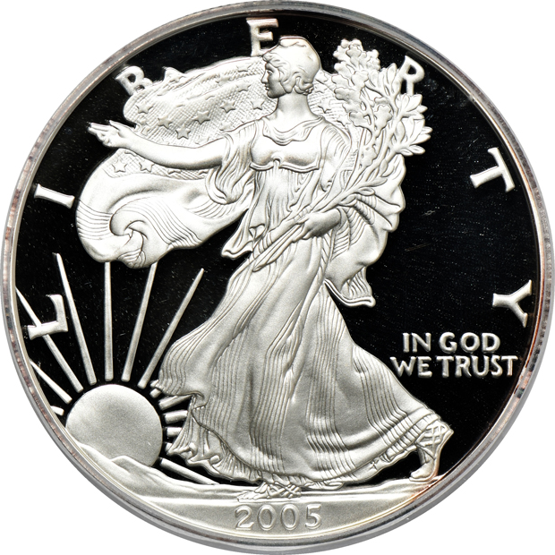 Seven Morgan silver dollars, eight Eisenhower dollars, and a 2005-W Proof silver eagle, all PCGS