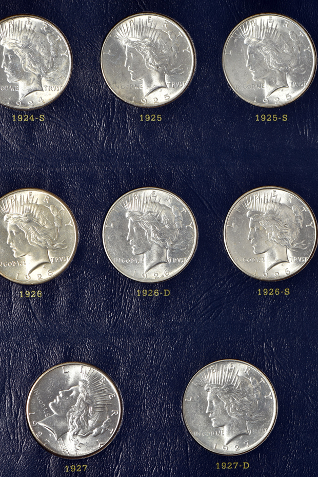 Complete collection of Peace dollars in a Whitman Classic 9130 album