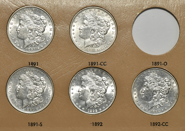 Collection of seventy-eight different Morgan silver dollars in two Dansco albums
