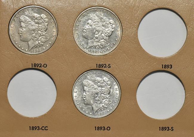 Collection of seventy-eight different Morgan silver dollars in two Dansco albums