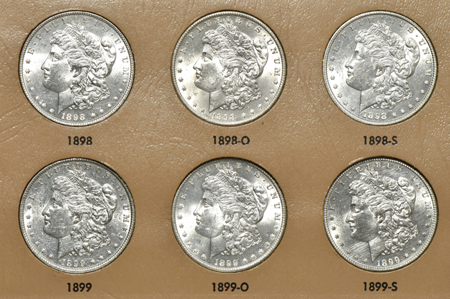 Collection of seventy-eight different Morgan silver dollars in two Dansco albums
