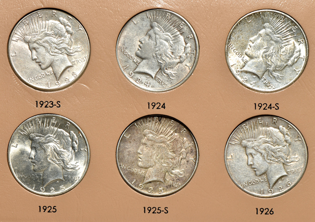 Complete collection of Peace silver dollars in a Dansco 7175 album