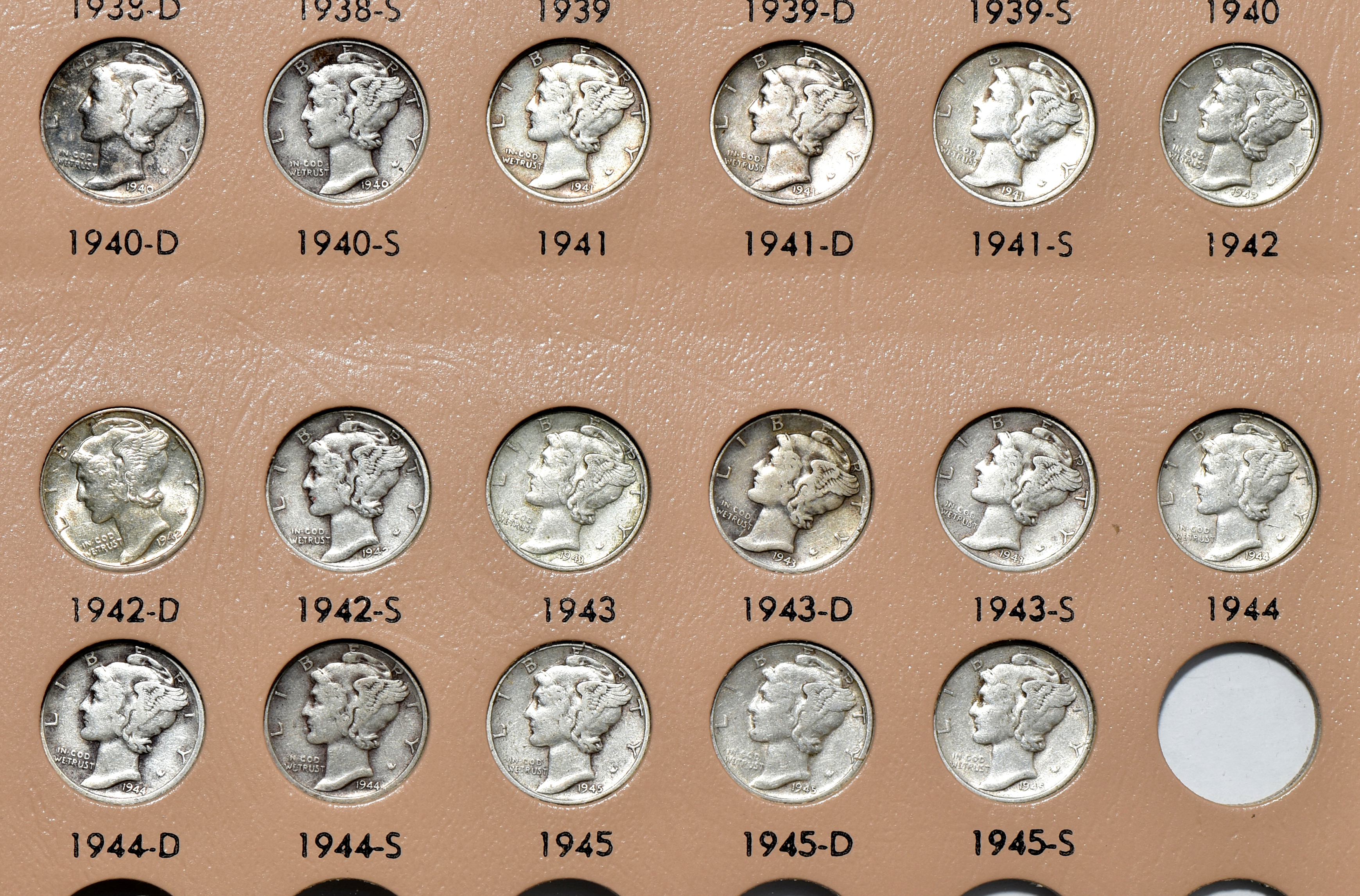 Complete collection of Mercury dimes in a Dansco 7123 album