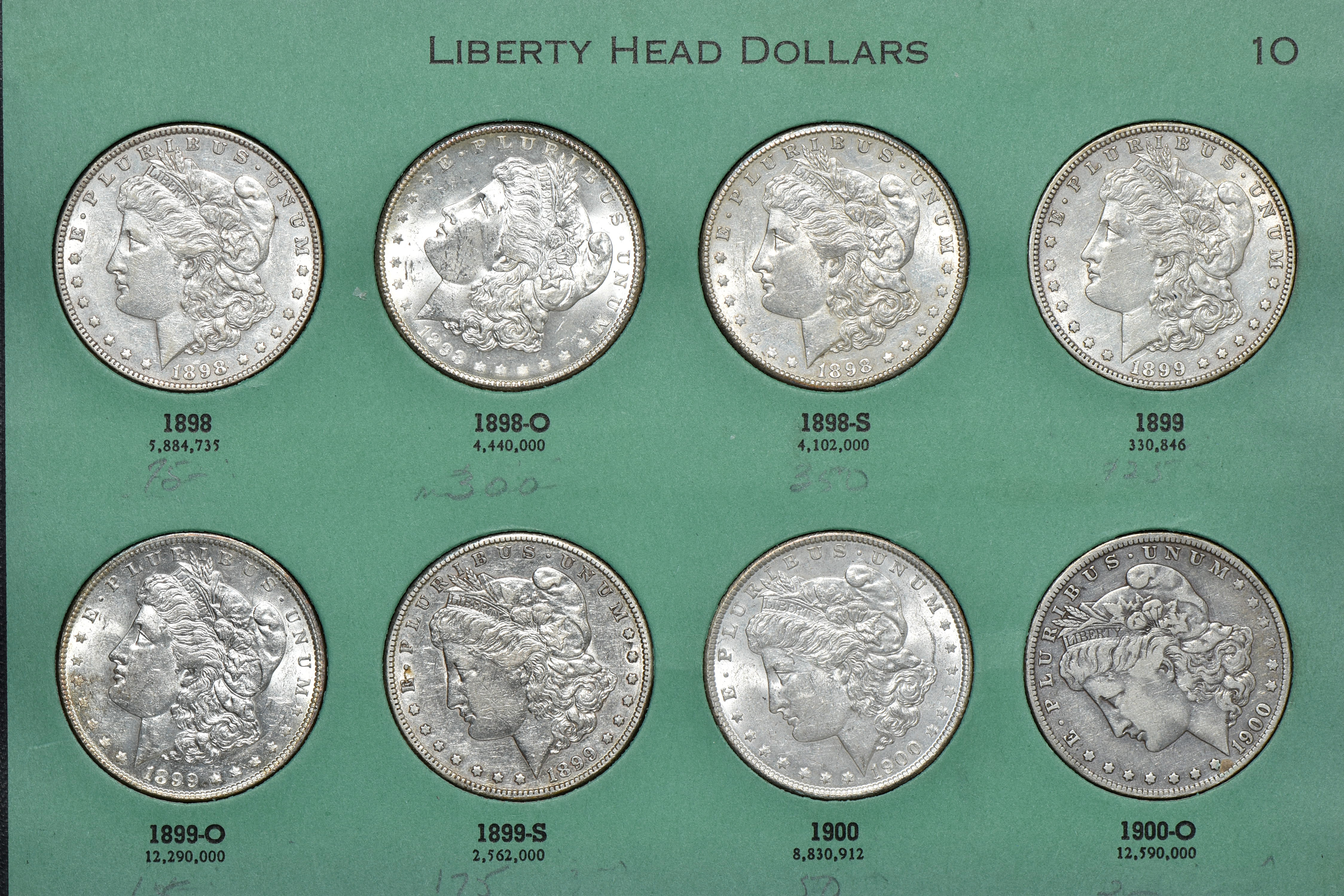 Collection of 32 different Morgan silver dollars, 1895-O through 1921-S, in a Meghrig album