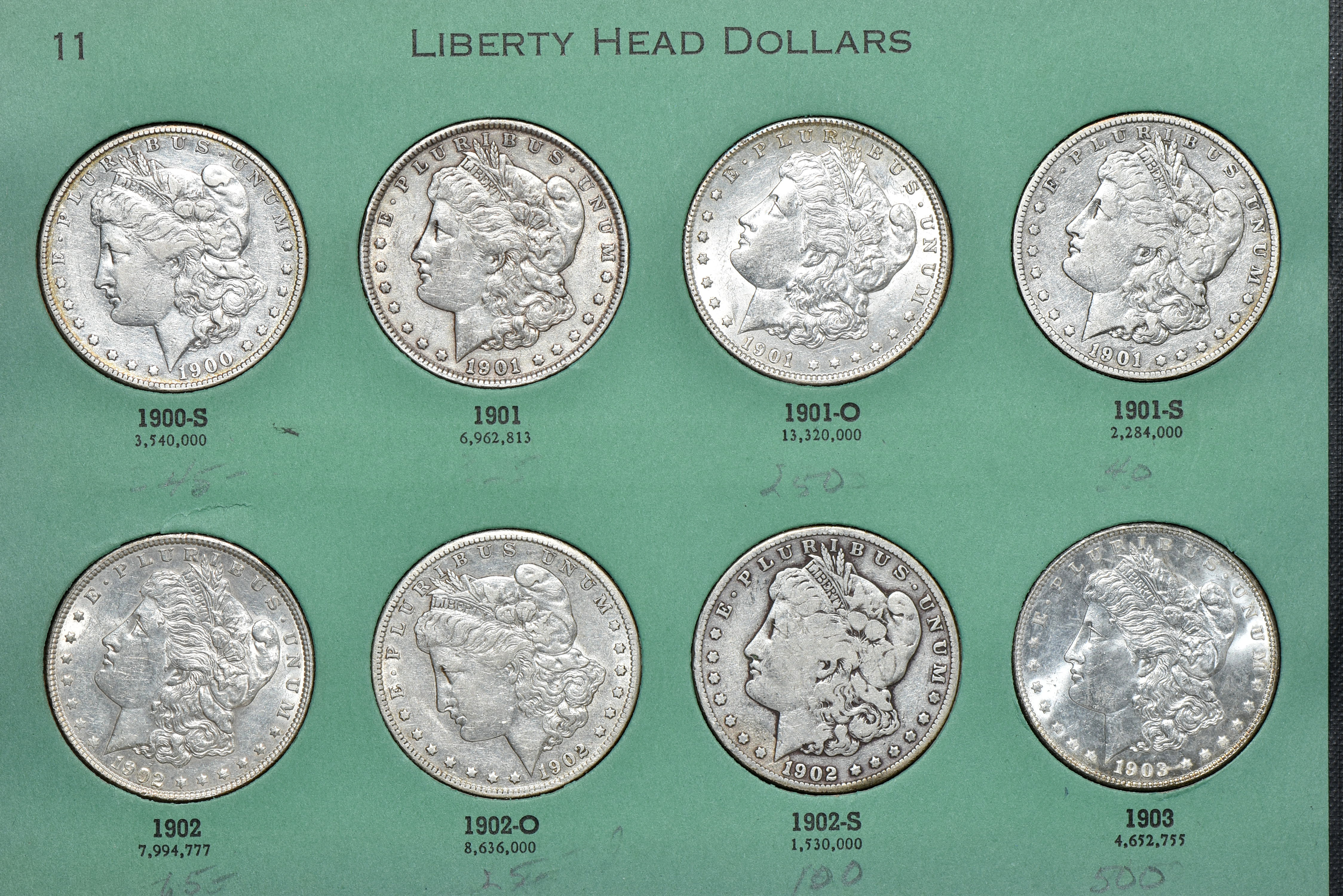 Collection of 32 different Morgan silver dollars, 1895-O through 1921-S, in a Meghrig album