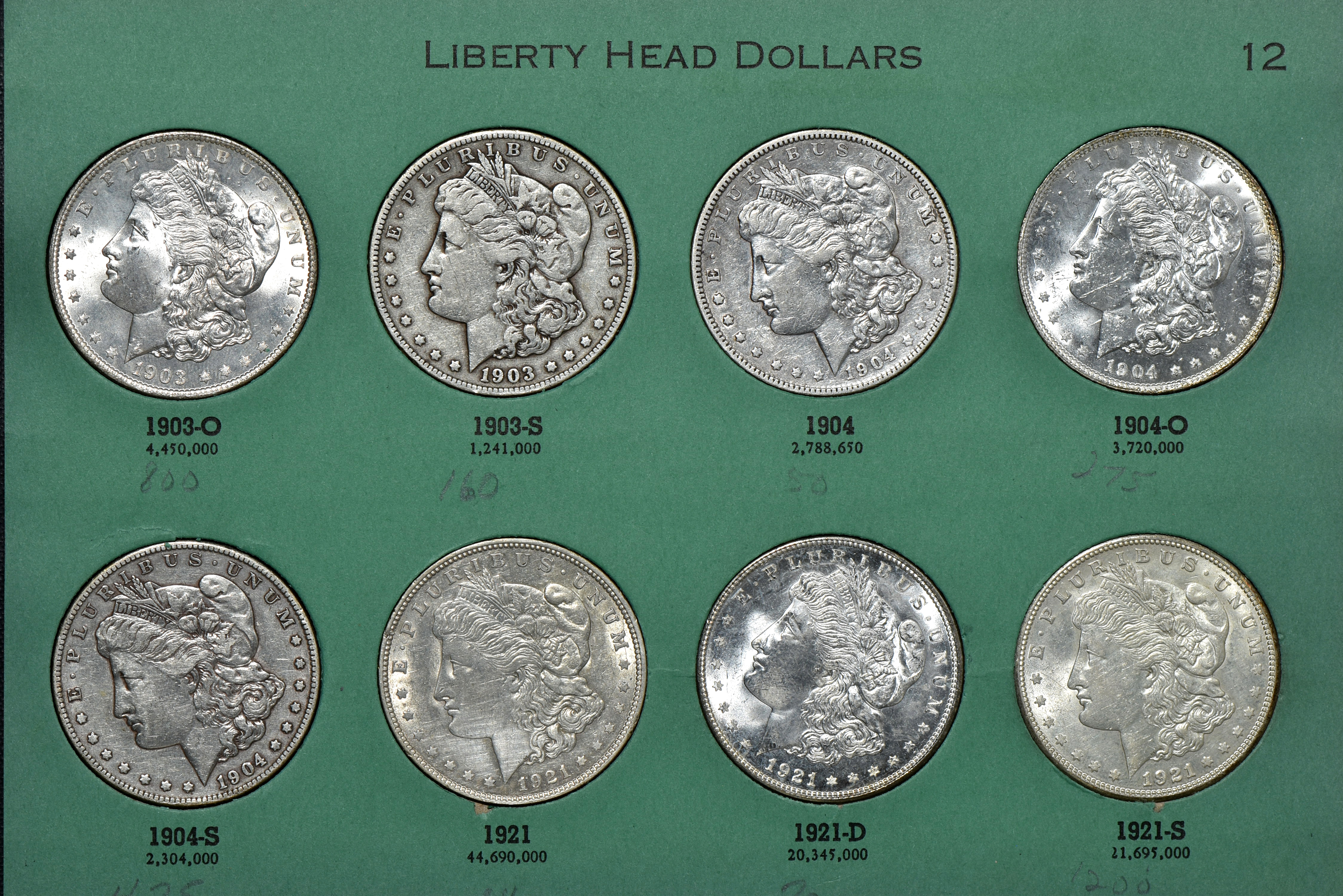 Collection of 32 different Morgan silver dollars, 1895-O through 1921-S, in a Meghrig album