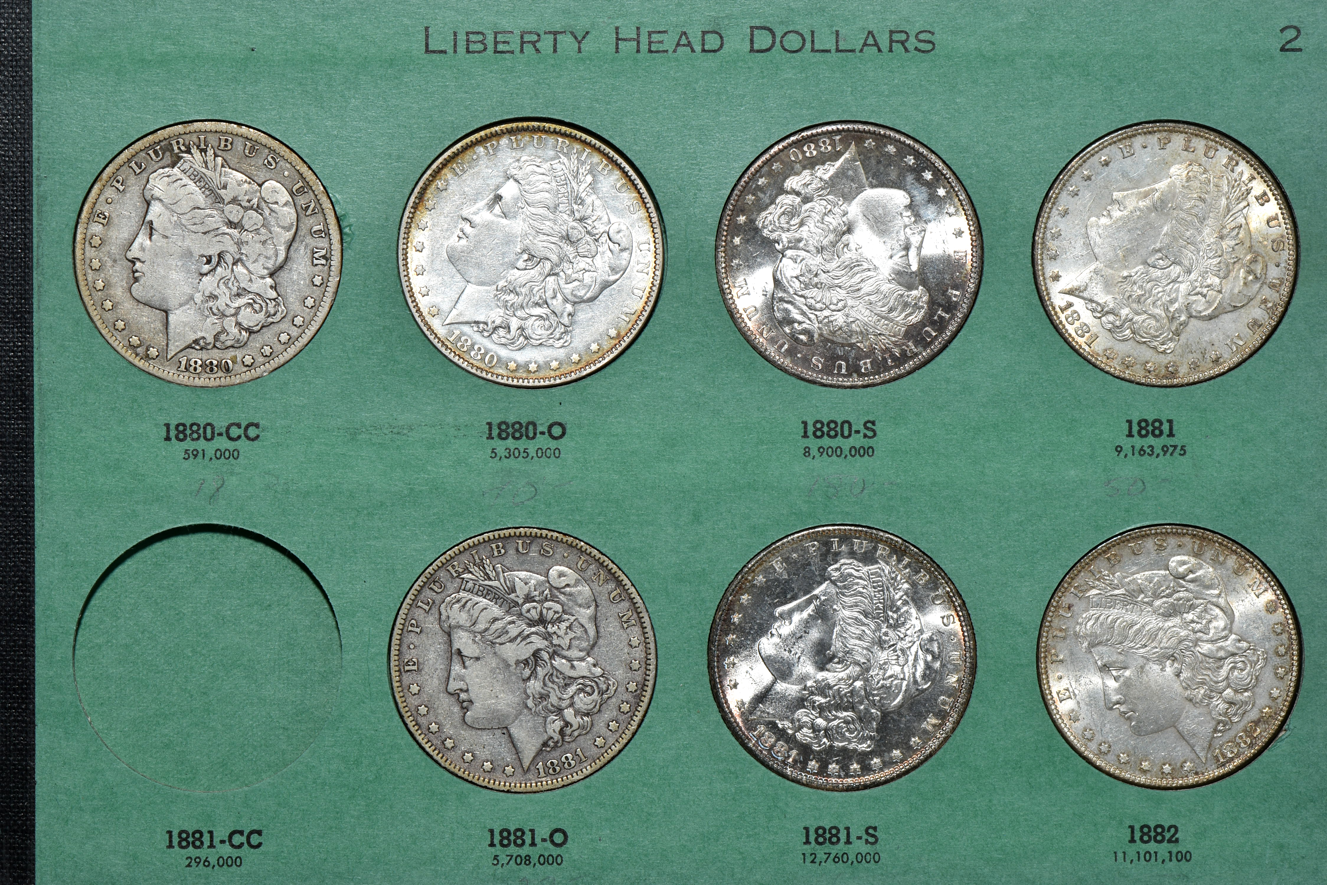 Collection of 31 different Morgan silver dollars in a Meghrig album