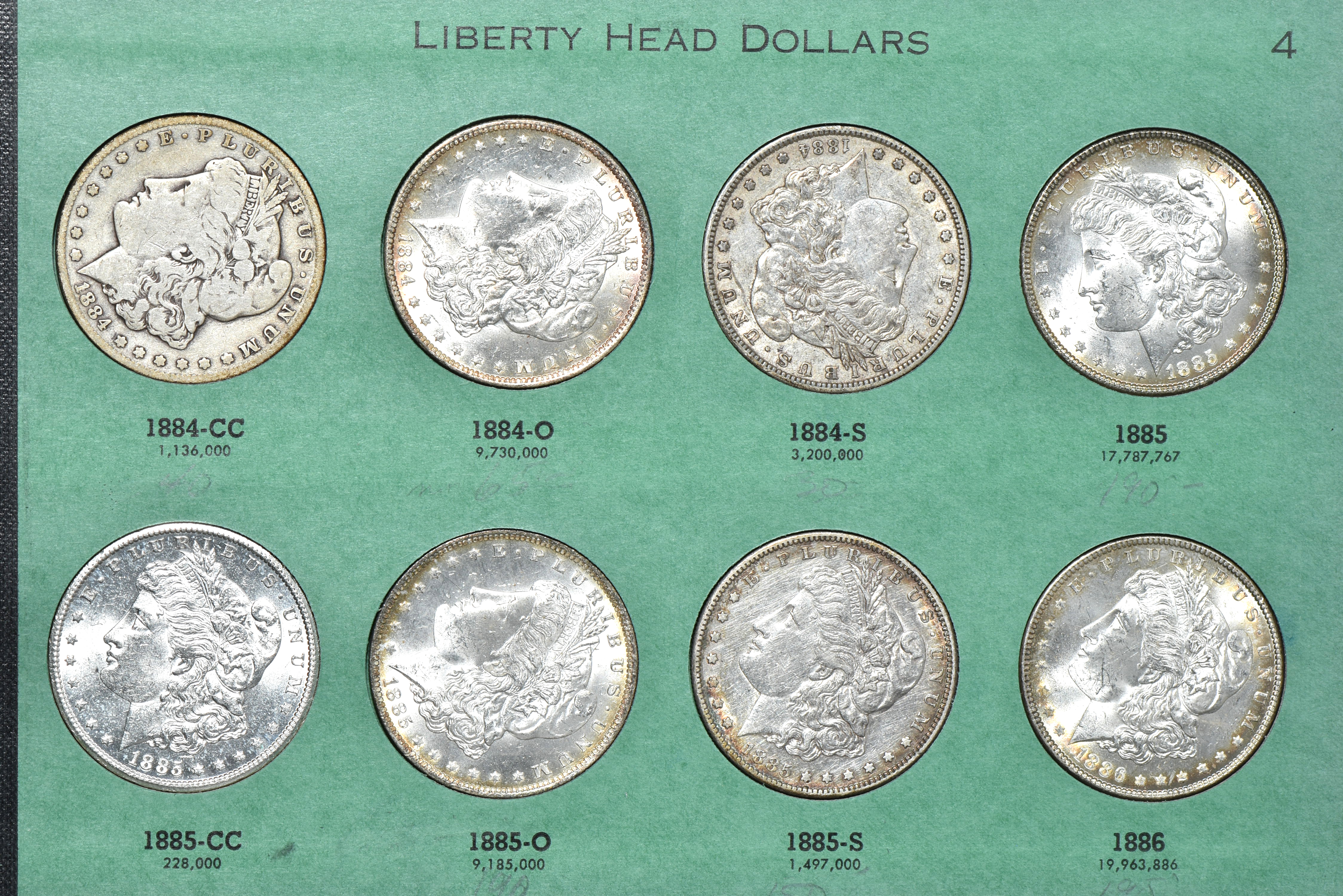 Collection of 31 different Morgan silver dollars in a Meghrig album