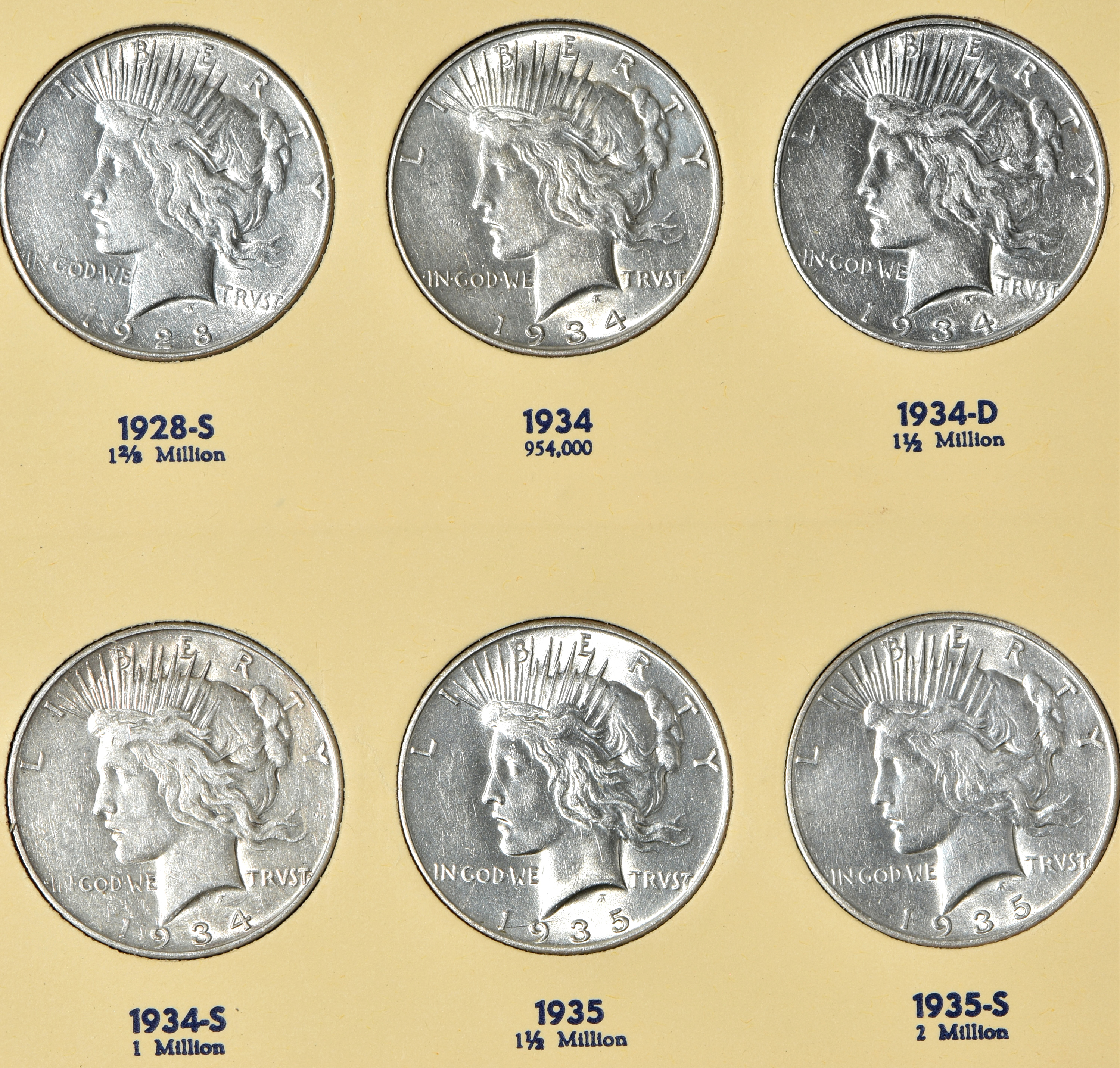 Complete collection of Peace silver dollars in a Library of Coin album