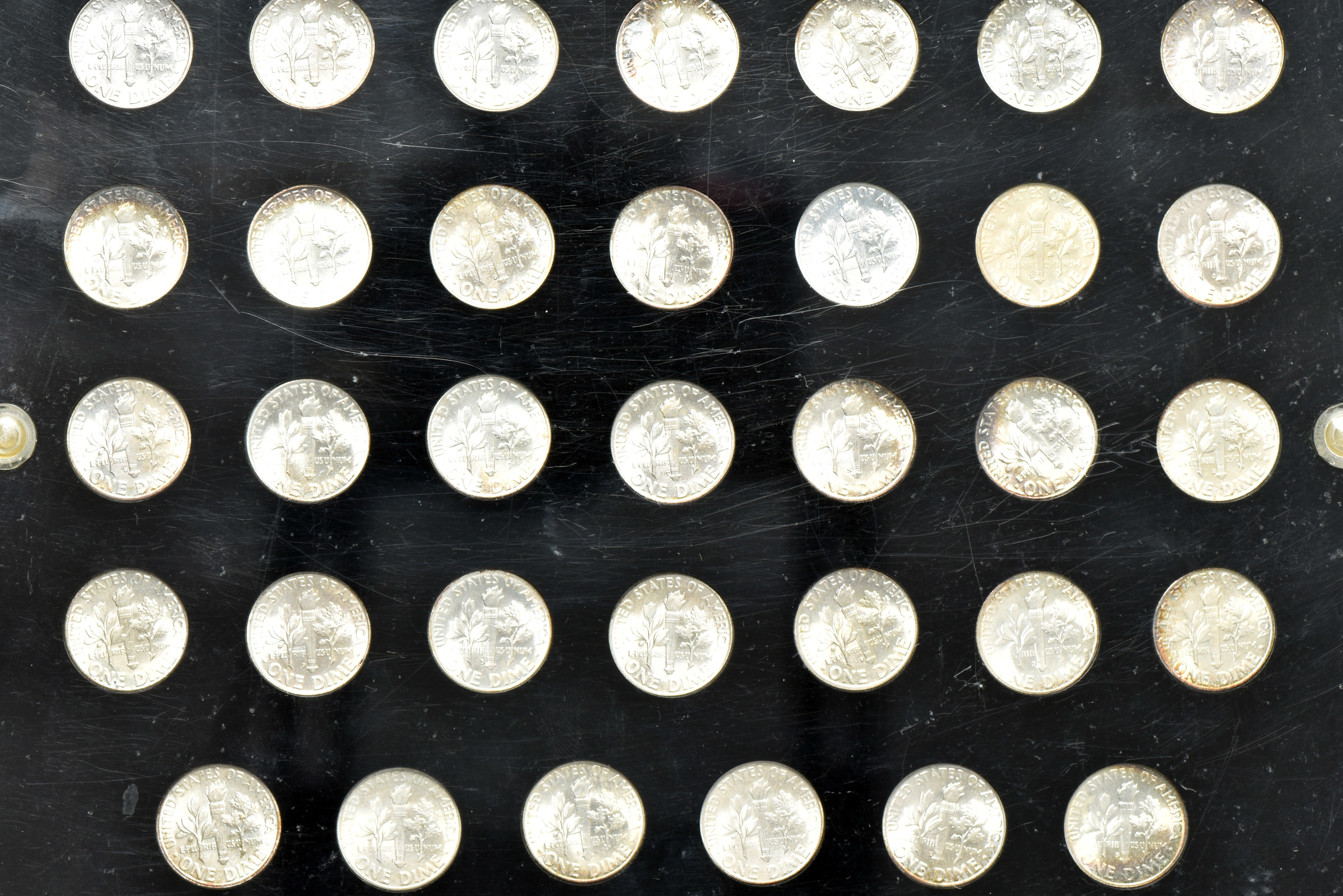Complete collection of Roosevelt dimes from 1946 through 1970 in a Capital Plastics holder