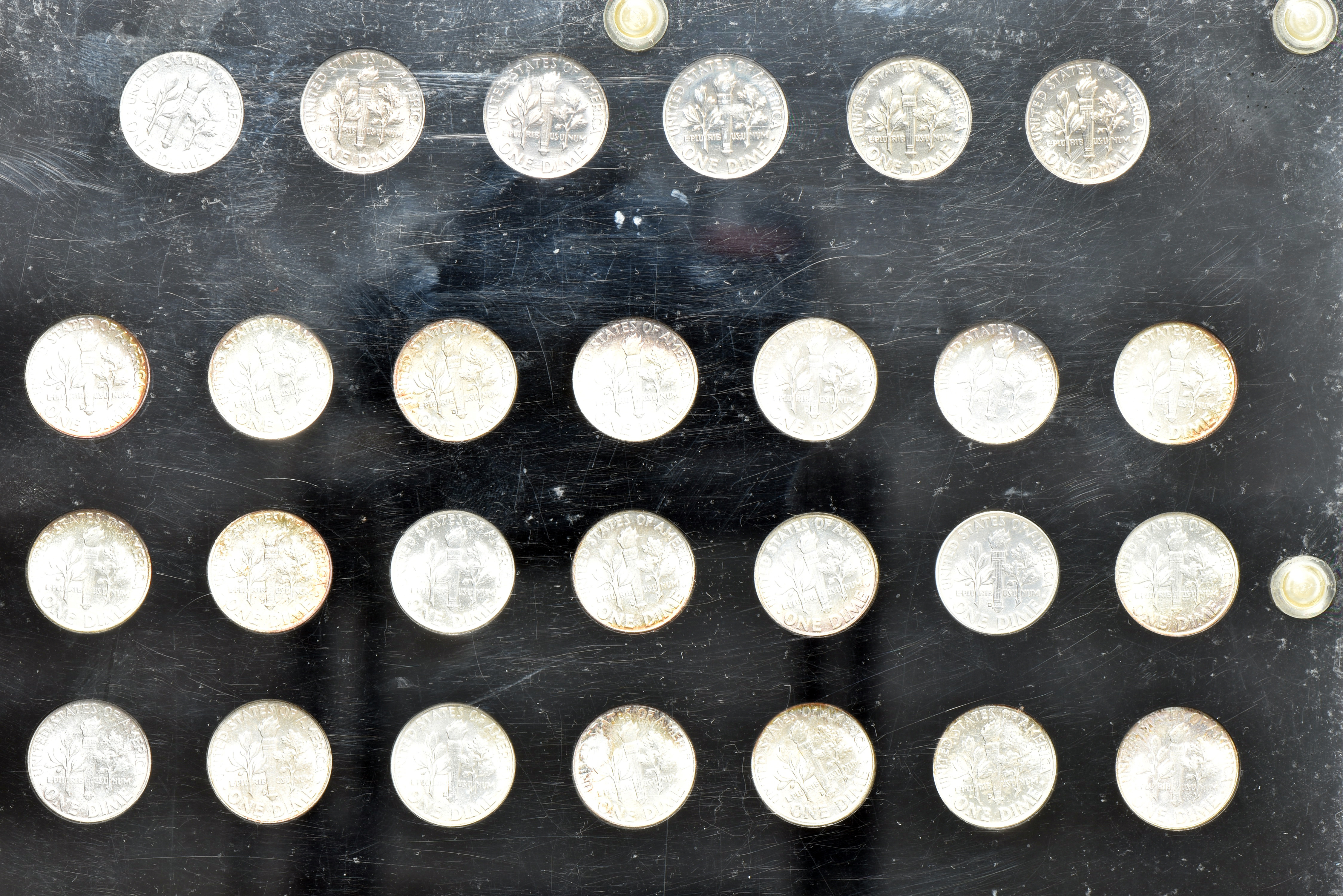 Complete collection of Roosevelt dimes from 1946 through 1970 in a Capital Plastics holder