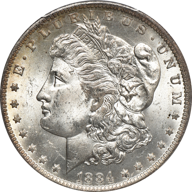 1884-O Morgan silver dollar MS-64+, 1903-O Morgan silver dollar MS-64, and a 1928 Oregon Trail commemorative half-dollar MS-66, all PCGS