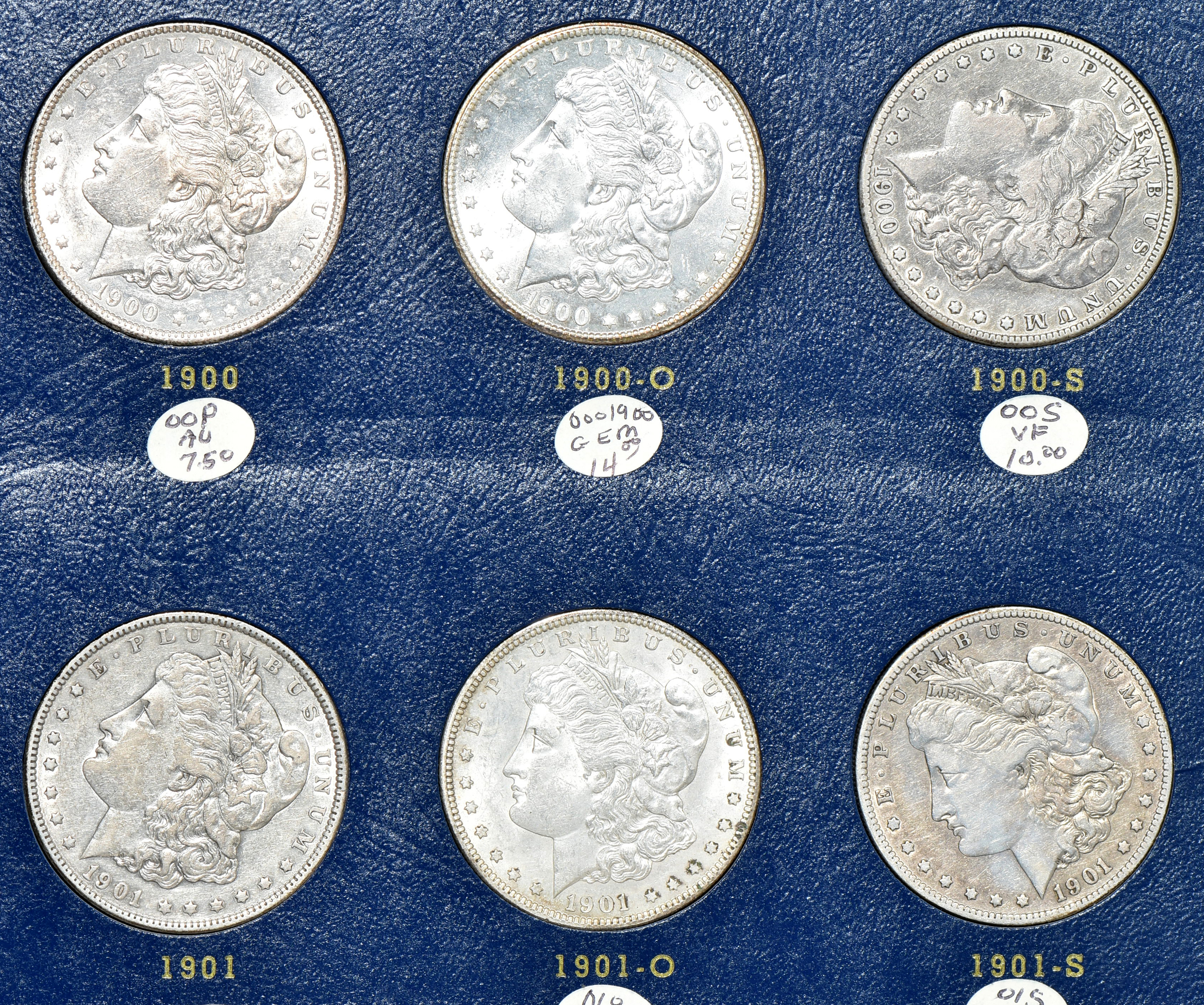 Collection of Morgan silver dollars 1897 through 1921-S in a Whitman 9429 album