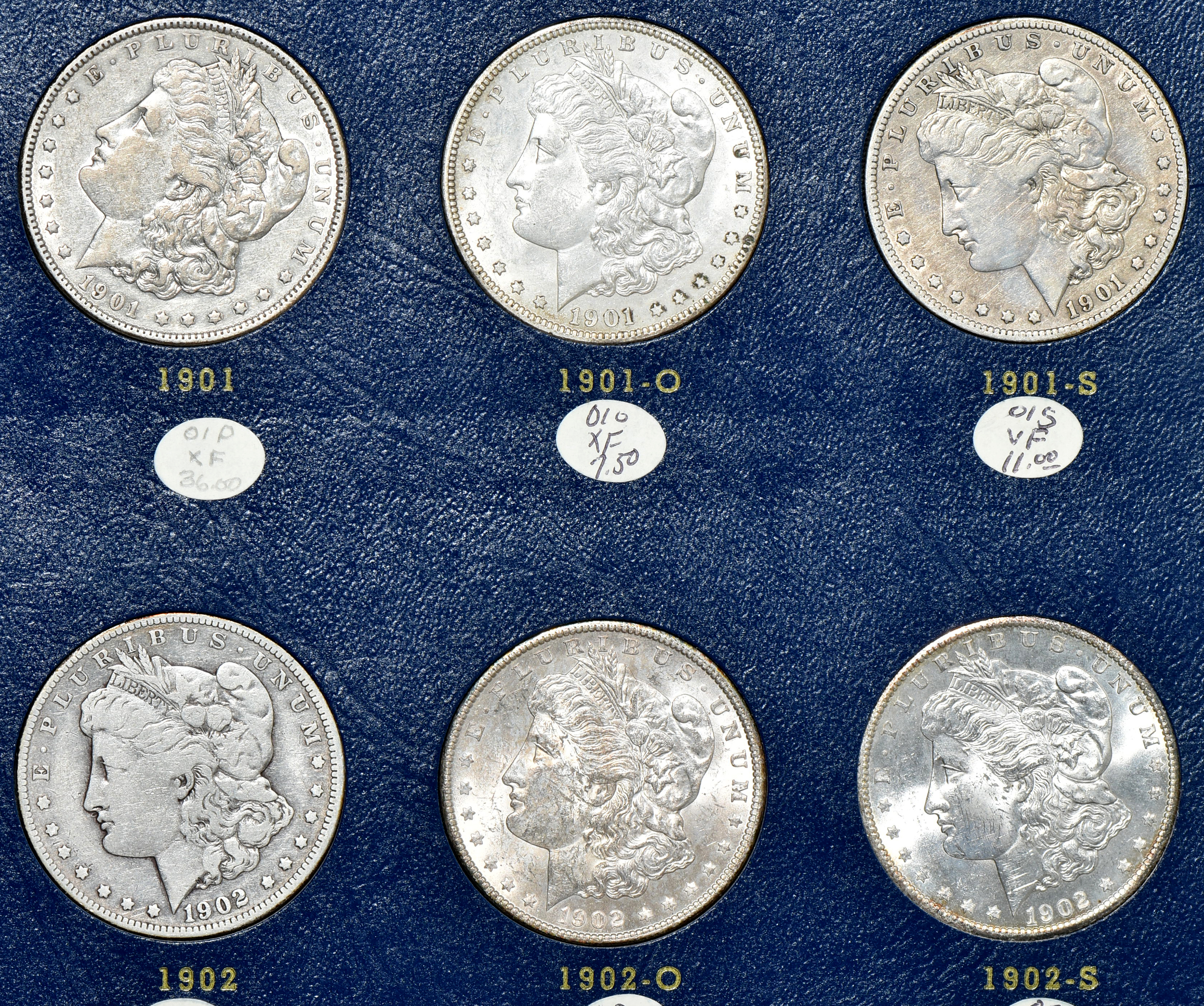 Collection of Morgan silver dollars 1897 through 1921-S in a Whitman 9429 album
