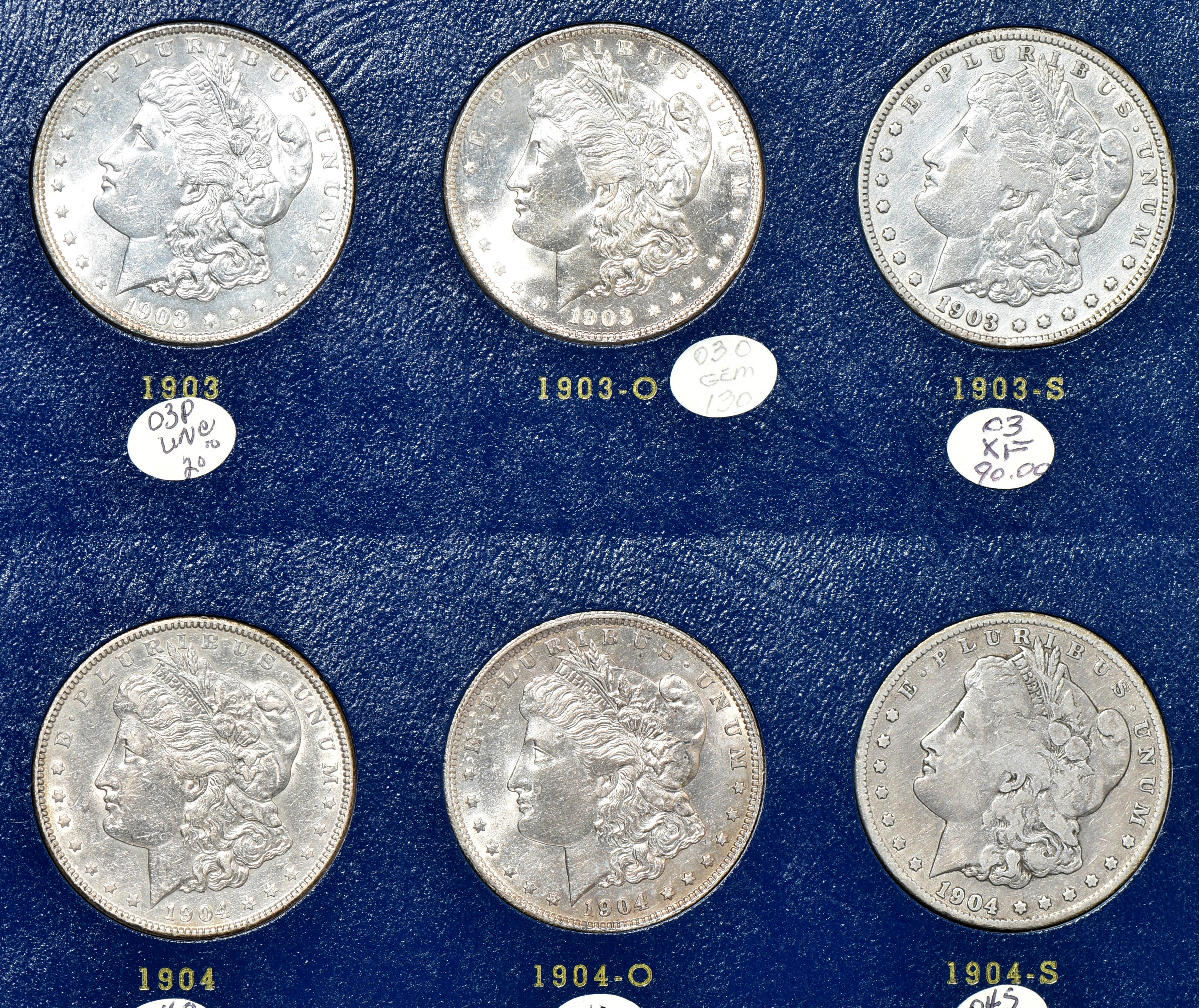 Collection of Morgan silver dollars 1897 through 1921-S in a Whitman 9429 album