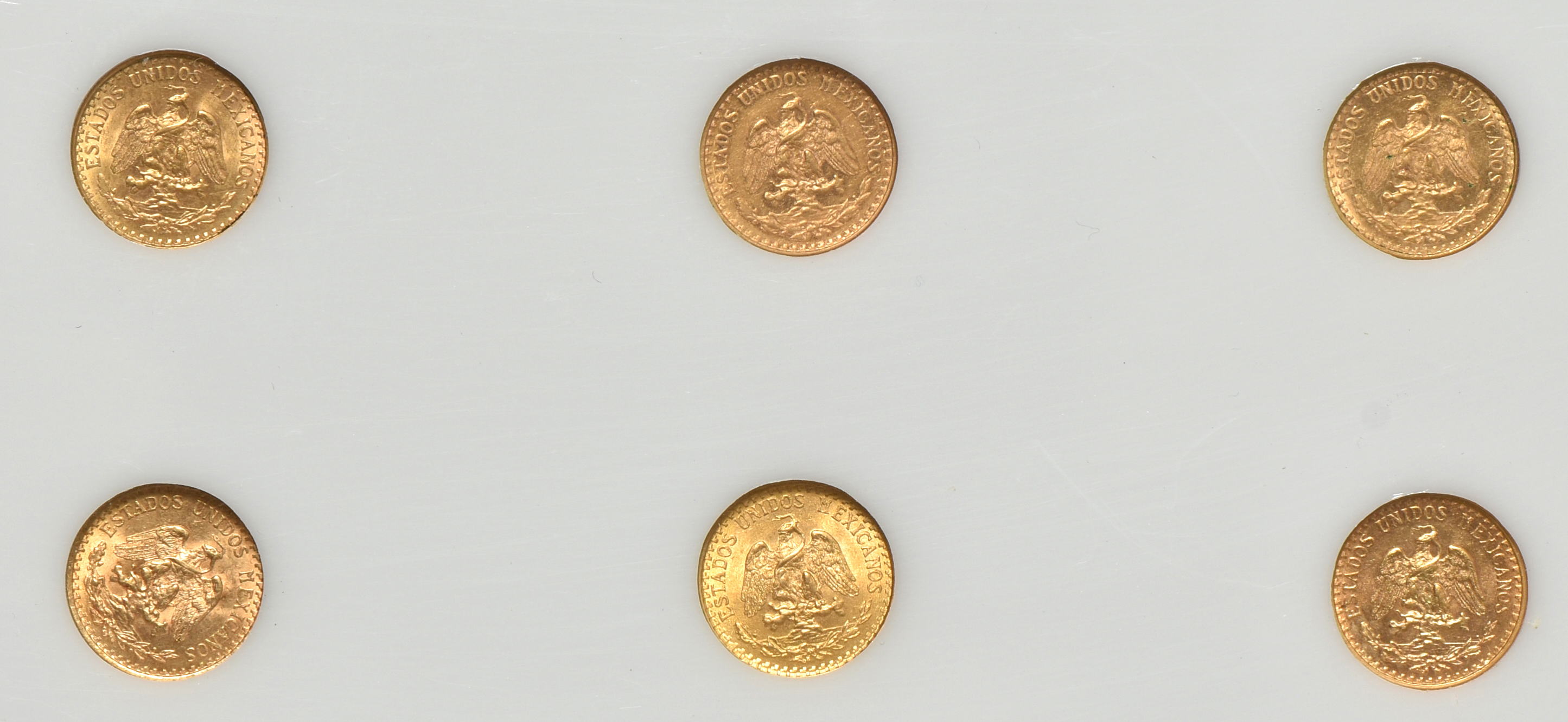 Mexico - Gold 2 pesos set in a Capital Plastics holder