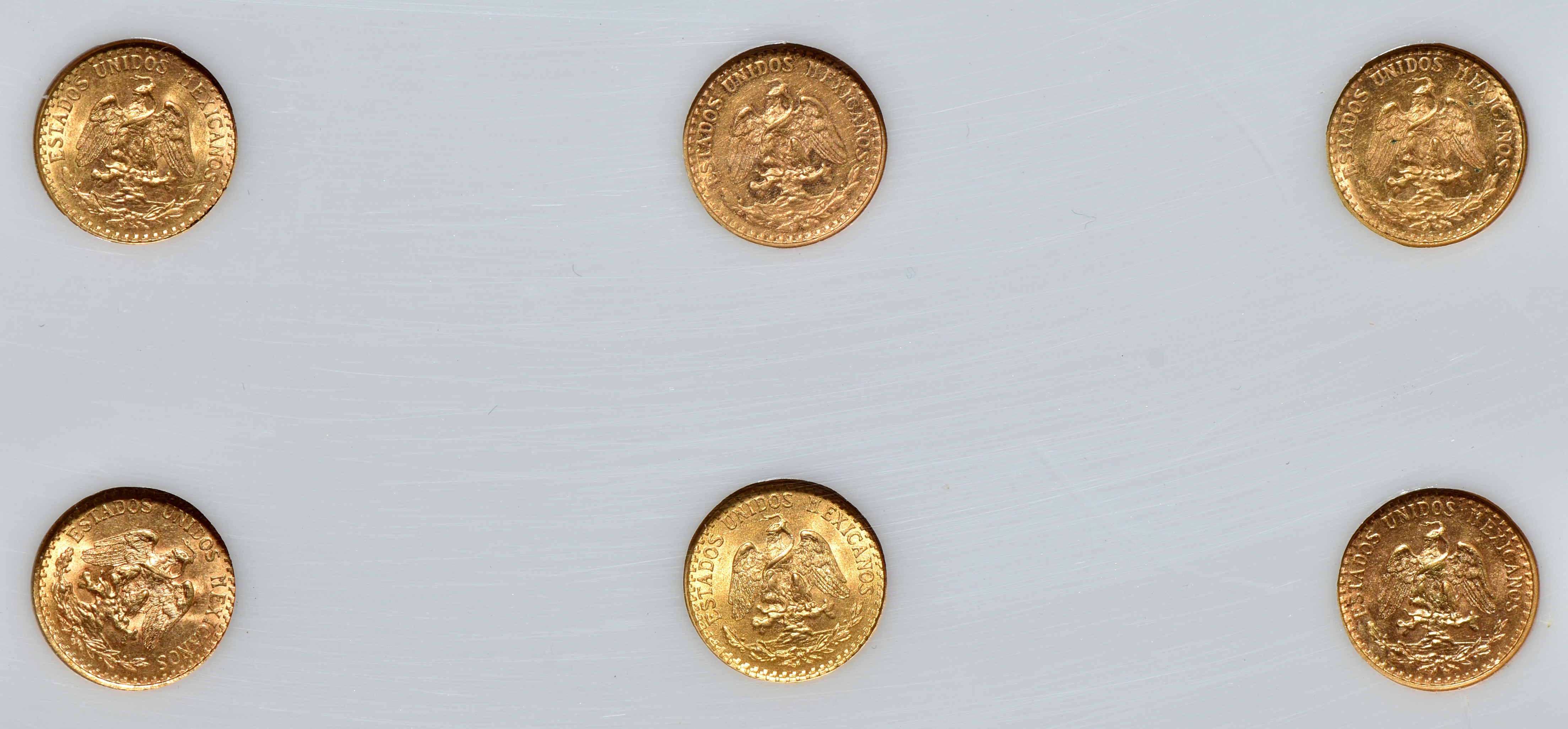 Mexico - Gold 2 pesos set in a Capital Plastics holder