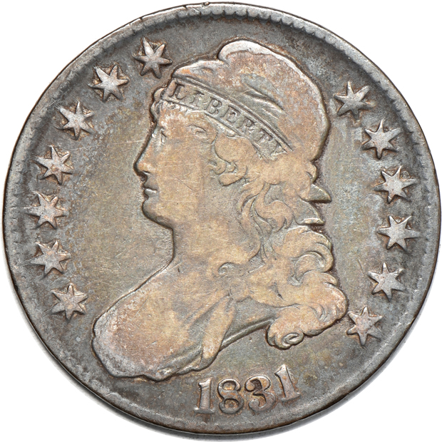 Seven different Capped Bust half-dollars