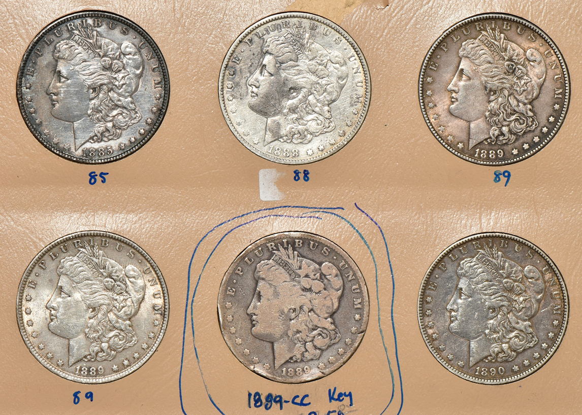 Dansco album with fifty-four silver dollars