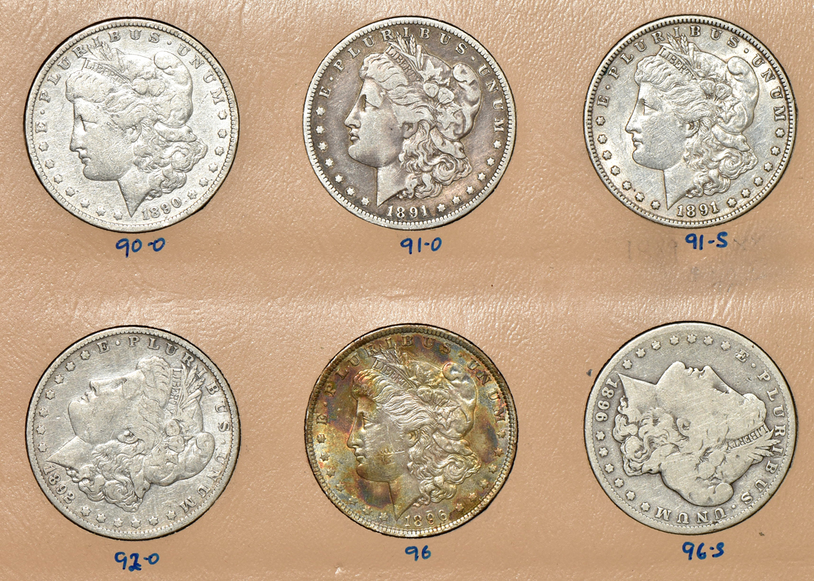 Dansco album with fifty-four silver dollars
