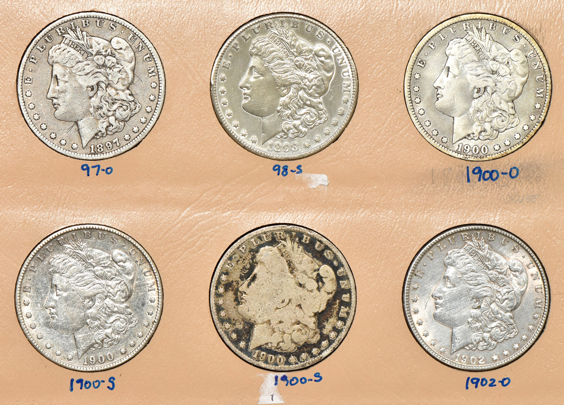 Dansco album with fifty-four silver dollars
