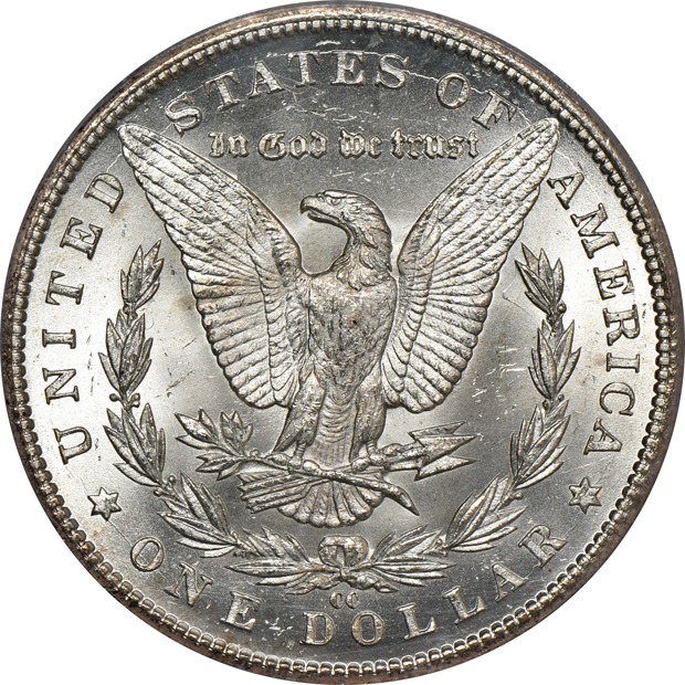 1884-CC PCGS MS-65, and an 1885-CC ICG MS-63