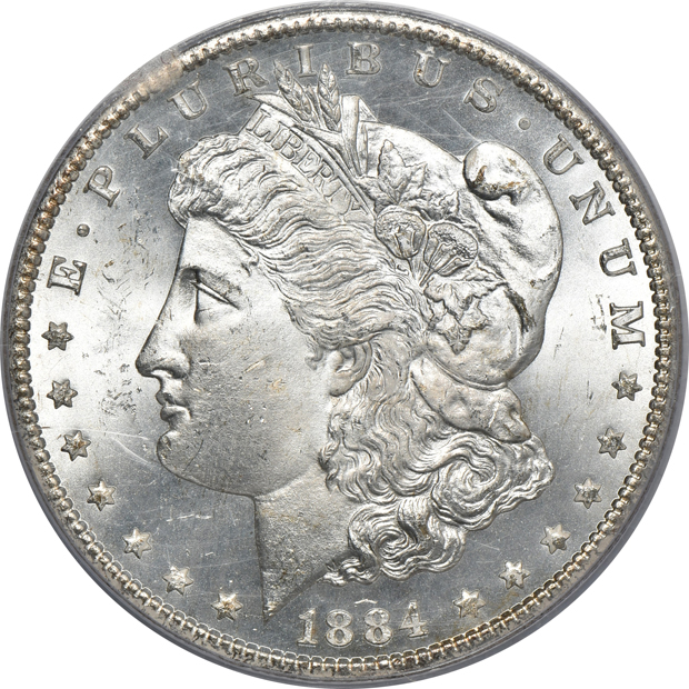 1884-CC PCGS MS-65, and an 1885-CC ICG MS-63