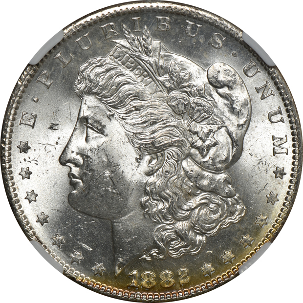 1882-S MS-63, and an 1885-O MS-64 Star, both NGC CAC