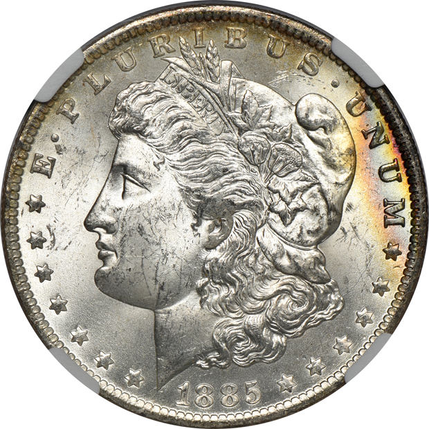 1882-S MS-63, and an 1885-O MS-64 Star, both NGC CAC