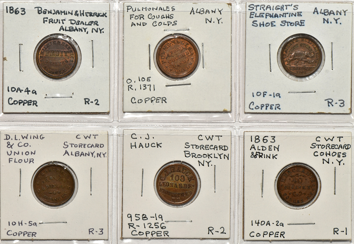 Group of 140 Civil War tokens in a Dansco album