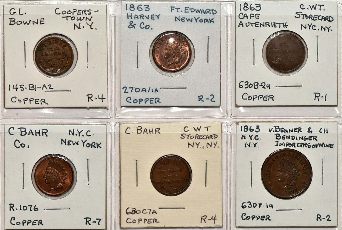 Group of 140 Civil War tokens in a Dansco album