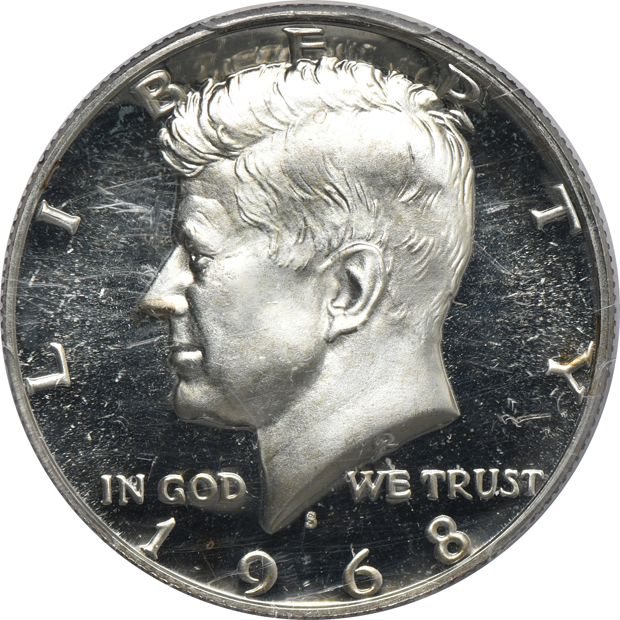 Eight certified Kennedy half-dollars