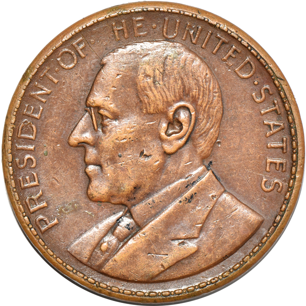 Group of medals, Wilson dollars, and Philippine coinage