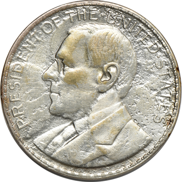 Group of medals, Wilson dollars, and Philippine coinage