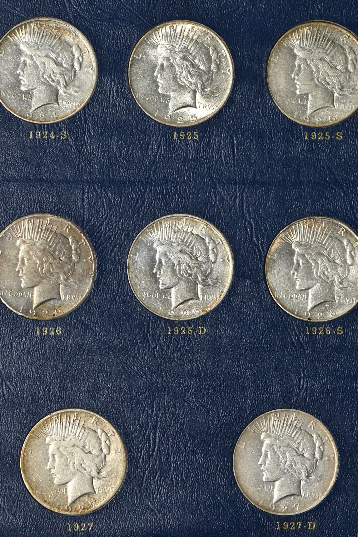 Complete collection of Peace silver dollars in a Whitman 9430 album