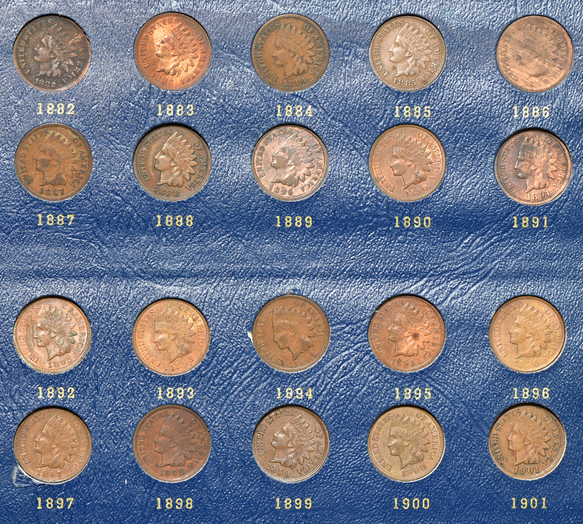 Three Flying Eagle cents (one no-date), and 56 different Indian cents (all but the 1869/1868) in a Whitman 9402 album