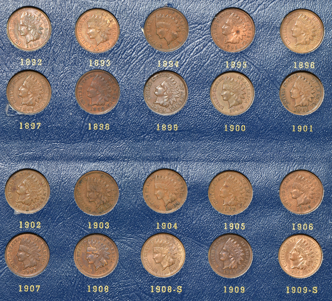 Three Flying Eagle cents (one no-date), and 56 different Indian cents (all but the 1869/1868) in a Whitman 9402 album