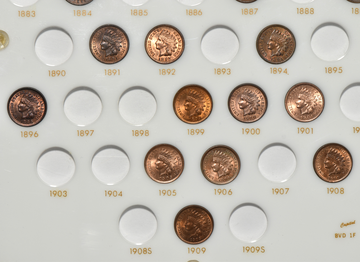 Collection of three Flying Eagle cents and 24 Indian cents in a Capital Plastics holder